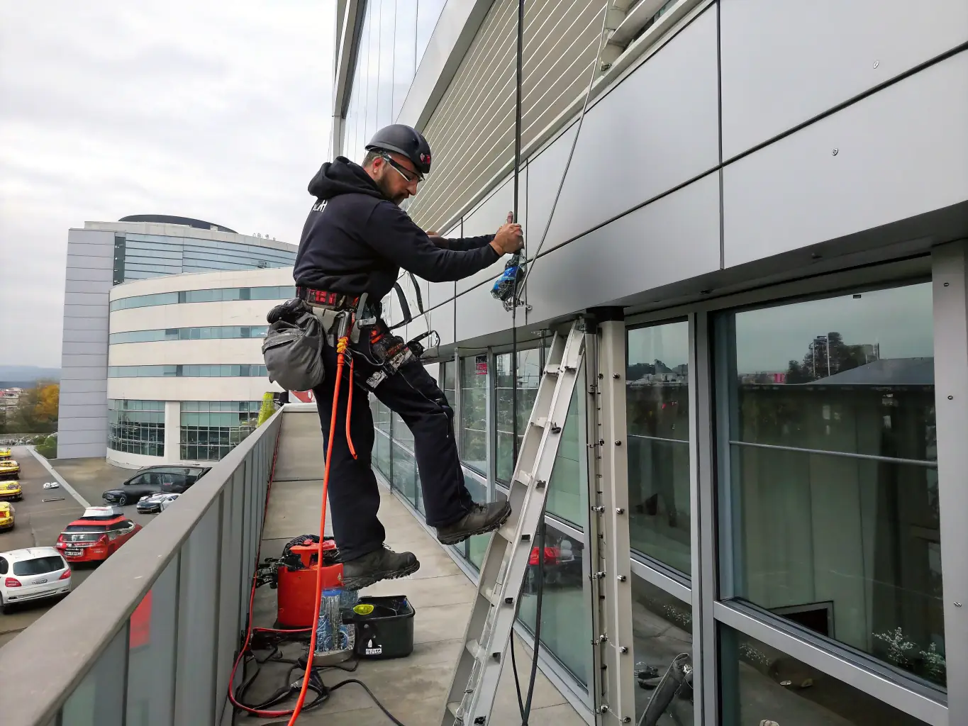 A photograph of a maintenance team proactively addressing a maintenance issue at a property managed by De Luca Group, emphasizing their commitment to preventive care.